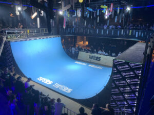 Blue vert skateboard ramp.